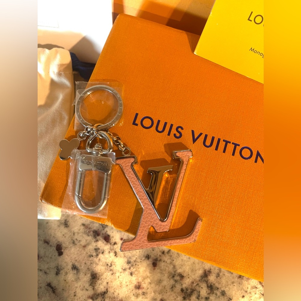 Louis Vuitton leather bag charm and key holder